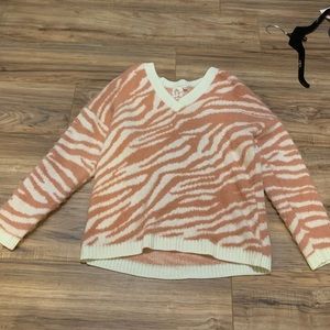 Pink and white zebra print sweater